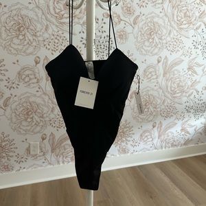 Size small Forever 21 black body suit never worn
